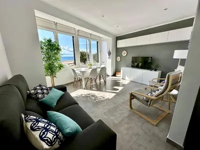 Zona de estar de Apartamento en primera linea con vistas al mar - VistaMar Blanes