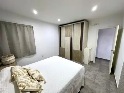 Cama o camas de una habitación en Apartamento en primera linea con vistas al mar - VistaMar Blanes