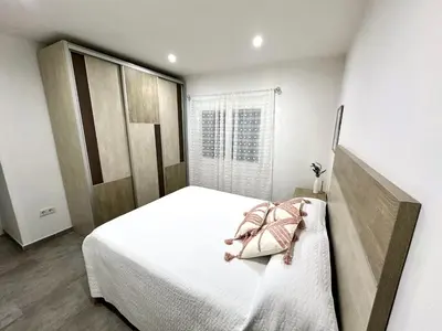 Cama o camas de una habitación en Apartamento en primera linea con vistas al mar - VistaMar Blanes