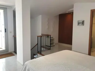 Cama o camas de una habitación en Les Camelias 2B