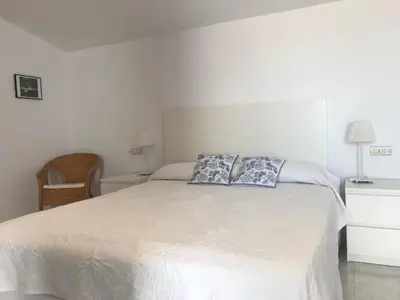 Cama o camas de una habitación en Les Camelias 2B