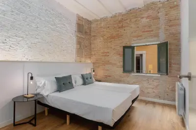 Cama o camas de una habitación en Flateli Sant Agustí