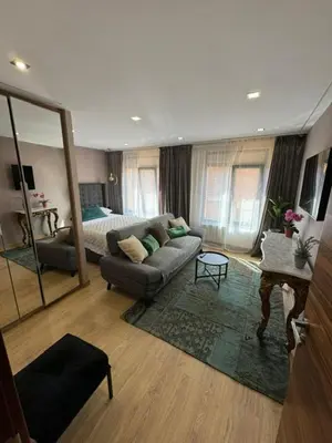 Zona de estar de Piso de dos dormitorios con reforma de diseño