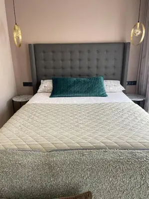 Cama o camas de una habitación en Piso de dos dormitorios con reforma de diseño