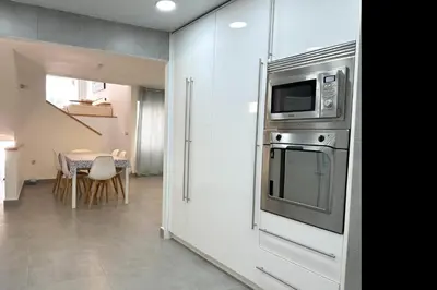 Una cocina o zona de cocina en LETS HOLIDAYS House beach in Cala Salions