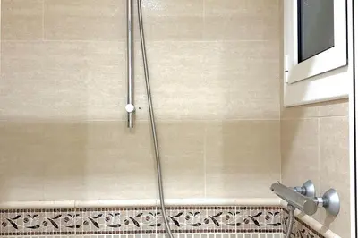 Un baño de LETS HOLIDAYS House beach in Cala Salions
