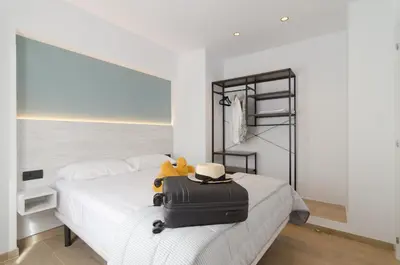 Cama o camas de una habitación en Estupendo apartamento en Lloret de Mar