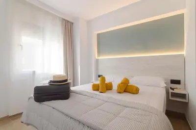 Cama o camas de una habitación en Estupendo apartamento en Lloret de Mar
