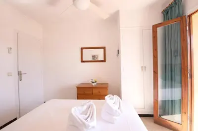 Cama o camas de una habitación en Vista mar en S'Agaró a 100m de la playa