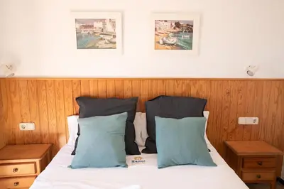 Cama o camas de una habitación en Vista mar en S'Agaró a 100m de la playa