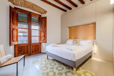Cama o camas de una habitación en Flateli Ballesteries 15