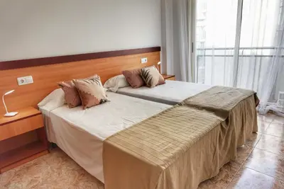 Cama o camas de una habitación en CBN Apartments