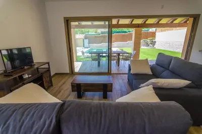 Una televisión o centro de entretenimiento en Club Villamar - Utopia