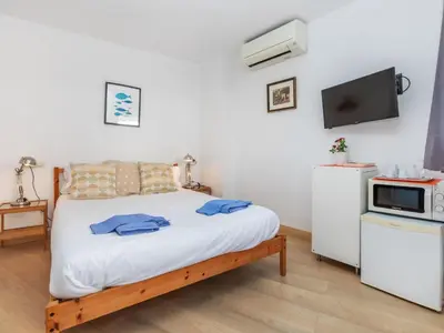 Cama o camas de una habitación en Apartment Mestral Atic by Interhome