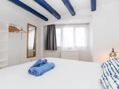 Cama o camas de una habitación en Apartment Mestral Atic by Interhome