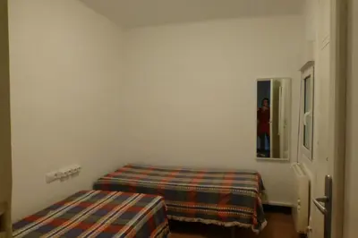 Cama o camas de una habitación en ALQUILER PISO BLANES con VISTAS AL MAR