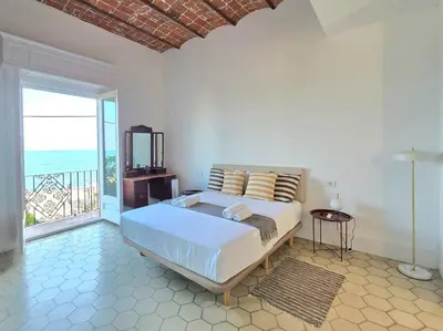 Cama o camas de una habitación en Casa Mas Blau | Increíbles vistas frente al mar