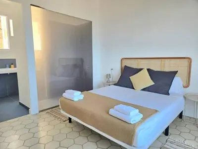 Cama o camas de una habitación en Casa Mas Blau | Increíbles vistas frente al mar