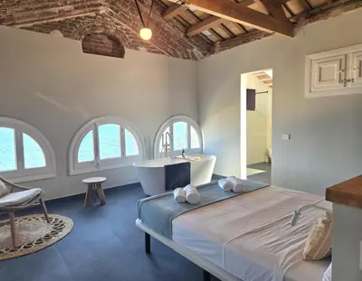 Cama o camas de una habitación en Casa Mas Blau | Increíbles vistas frente al mar