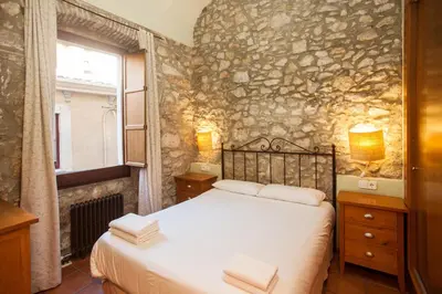 Cama o camas de una habitación en Rincón íntimo en Girona