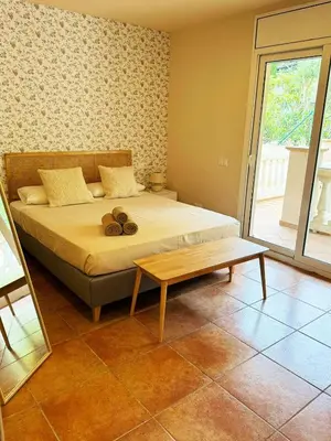 Cama o camas de una habitación en Villa Can Benet RENT IN BEGUR