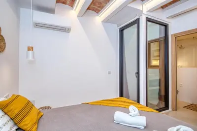 Cama o camas de una habitación en Casa de Pescadores con garaje