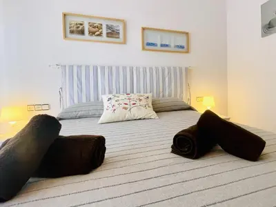 Cama o camas de una habitación en Voramar by Costabravaway