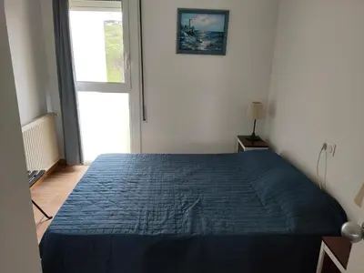 Cama o camas de una habitación en Bel appartement VUE MER