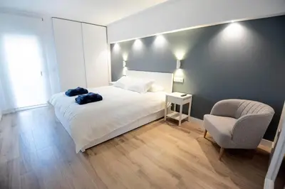 Cama o camas de una habitación en Amazimg apartment at 200m from the beach