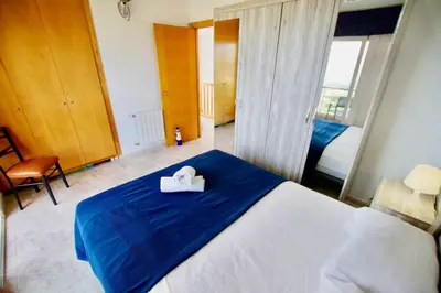 Cama o camas de una habitación en V&V LLORET- Villa Violetes