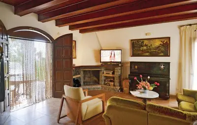 Zona de estar de Cozy Home In Palafolls