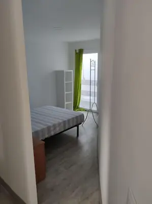 Cama o camas de una habitación en Apartment 3 minutes from the beach and train station on foot