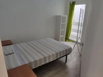 Cama o camas de una habitación en Apartment 3 minutes from the beach and train station on foot