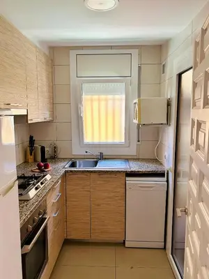 Una cocina o zona de cocina en Illa 76