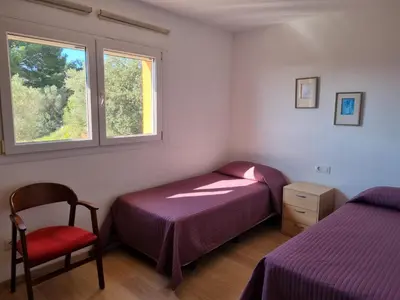 Cama o camas de una habitación en Vistas al mar