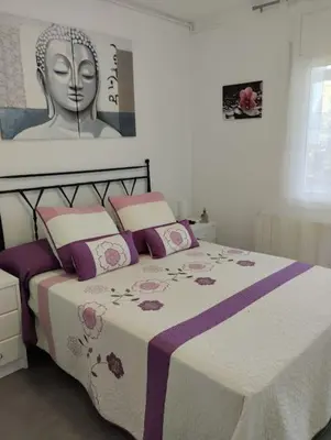 Cama o camas de una habitación en Precioso apartamento equipado