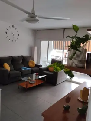 Zona de estar de Precioso apartamento equipado
