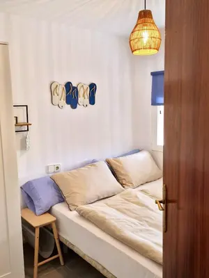 Cama o camas de una habitación en Villa de Gracia Casa 3