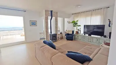 Una televisión o centro de entretenimiento en Casa Blanca