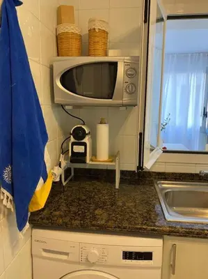 Una cocina o zona de cocina en Apartamento primera línea de mar en Platja d'aro