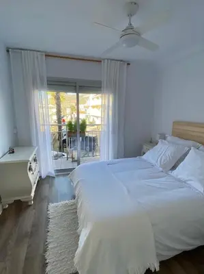 Cama o camas de una habitación en Apartamento primera línea de mar en Platja d'aro