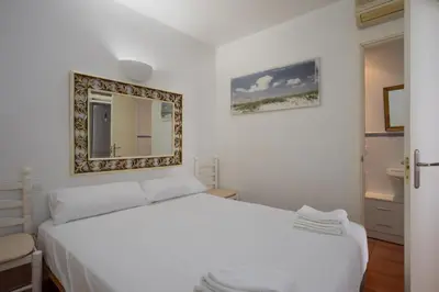 Cama o camas de una habitación en Flateli Sant Antoni 7