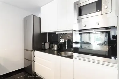 Una cocina o zona de cocina en Villa Karina Lloret de Mar