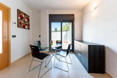 Zona de estar de PJS – Terraza, Piscina y Parking en Tossa