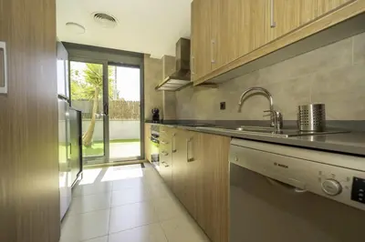 Una cocina o zona de cocina en PJS – Terraza, Piscina y Parking en Tossa