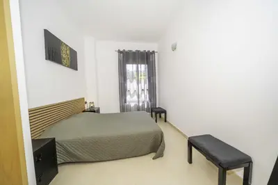 Cama o camas de una habitación en PJS – Terraza, Piscina y Parking en Tossa
