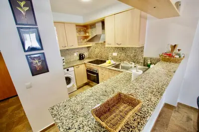 Una cocina o zona de cocina en V&V LLORET- Apartamento Bella