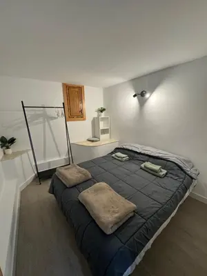 Cama o camas de una habitación en Piso con jardín, de Playa Fenals