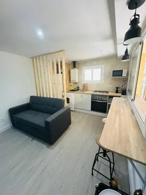 Una cocina o zona de cocina en Piso con jardín, de Playa Fenals