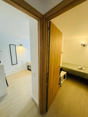 Cama o camas de una habitación en Piso con jardín, de Playa Fenals
